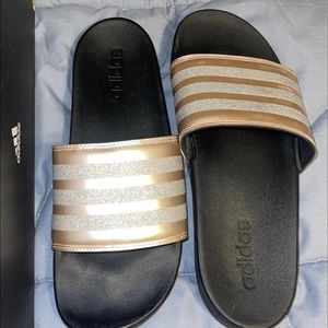 Adidas pink and silver striped black slides
